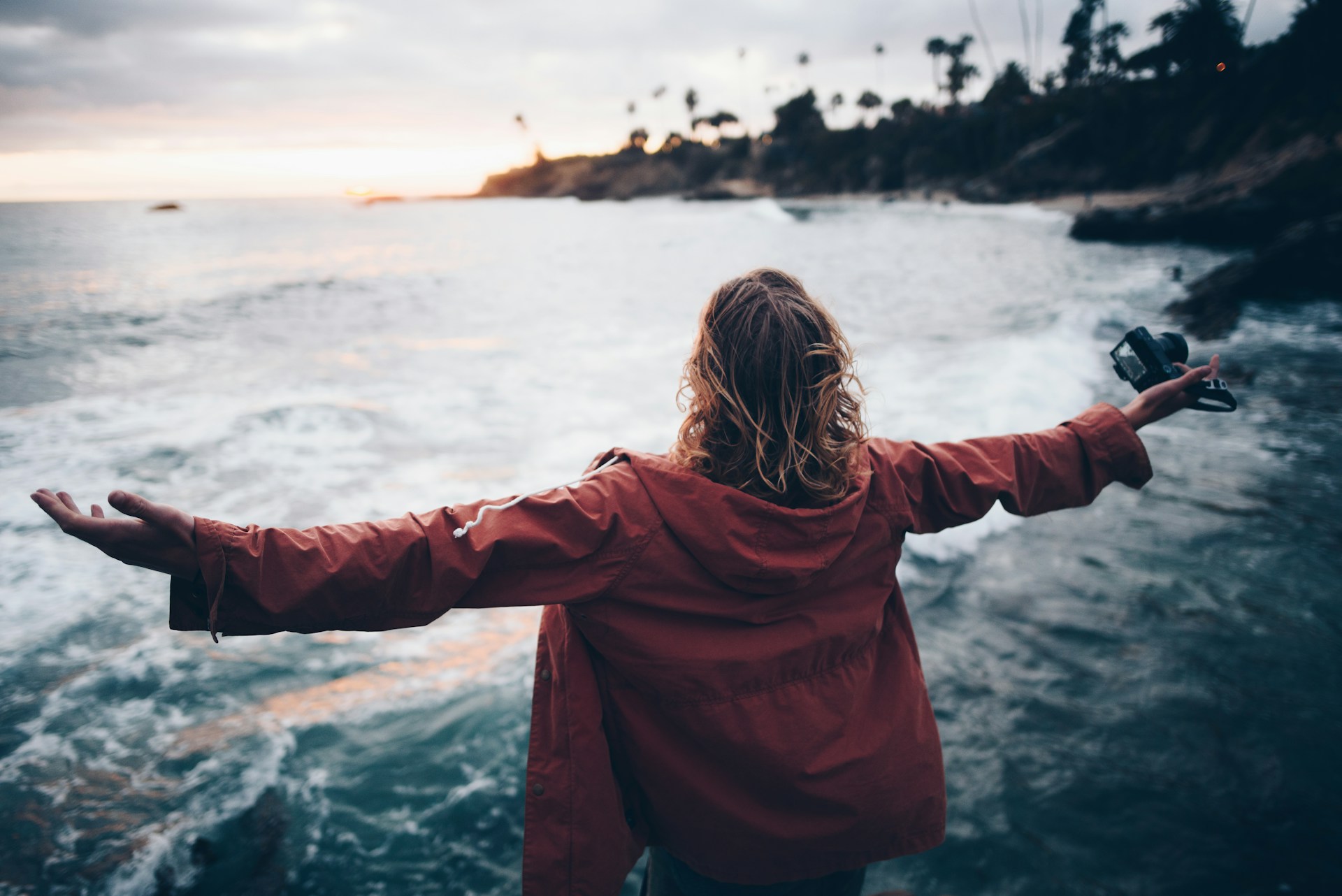 Woman near water with a sense of freedom